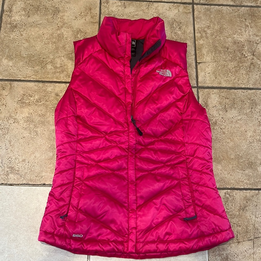 Hot pink The North Face puffer vest. Size Small.